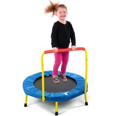 Girl smiling while jumping on the Fold-and-Go Trampoline