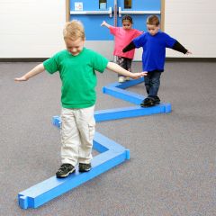 3 children walking and balancing on the blue Puzzle Beam Set