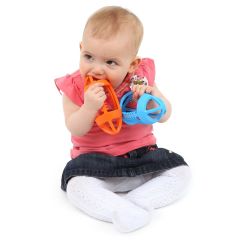 Baby with the Orange and Blue Grip It Football Chewy & Fidget (set of 2)