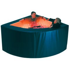 Kids relaxing in the SensaSoft™ Vibroacoustic Corner Ball Pit