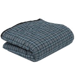 A folded Weighted Plaid Sleeping Bag