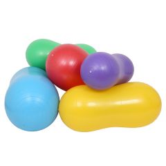 Girl smiling while holding the purple Peanut Ball alongside 4 more peanut balls in colors blue, green, red, yellow